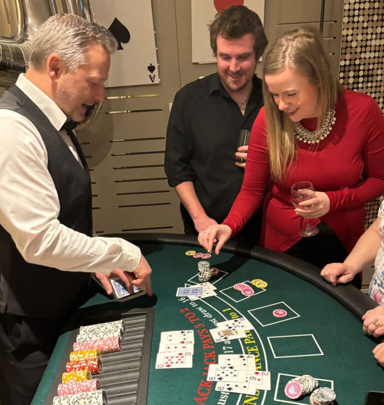 Guests play blackjack at birthday party