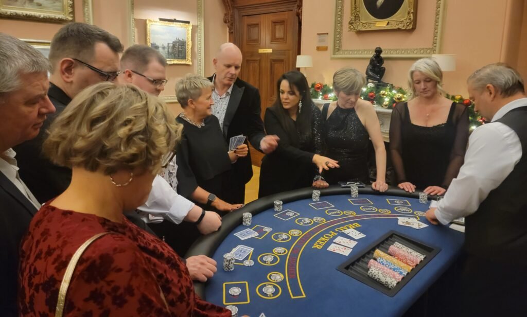 Guests play 3 card poker at a fun casino night