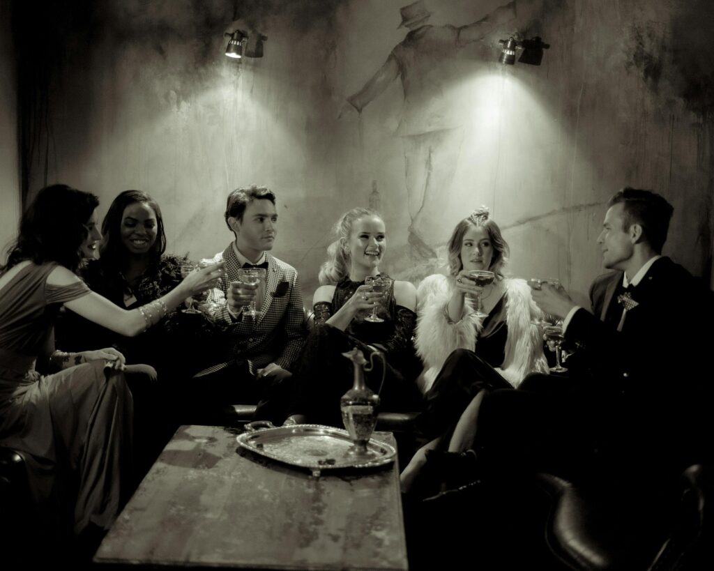 Stylish group enjoying a sophisticated evening in a luxurious classic interior.